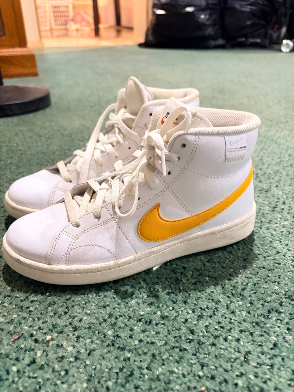 Nike Kids High-Top Sneakers in White with Yellow Swoosh